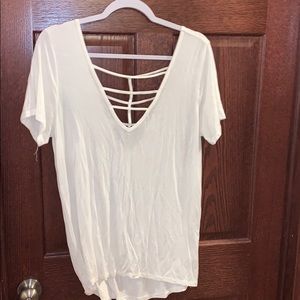 white float shirt with cut outs